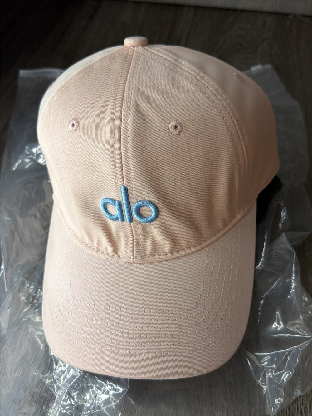 ALO Yoga Kids Peach Cap with Light Blue Logo